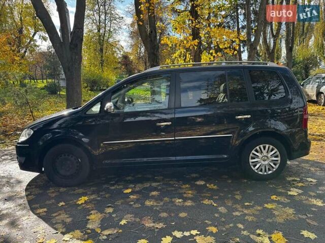 Фольксваген Туран 2007 в Киеве на Automoto.ua Черный Фольксваген Туран, объемом двигателя 1.4 л и пробегом 242 тыс. км за 6390 $, фото 11 на Automoto.ua