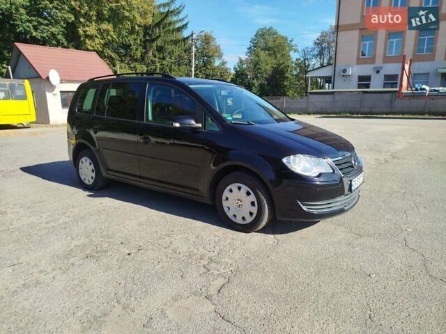 Черный Фольксваген Туран, объемом двигателя 1.98 л и пробегом 290 тыс. км за 5550 $, фото 2 на Automoto.ua