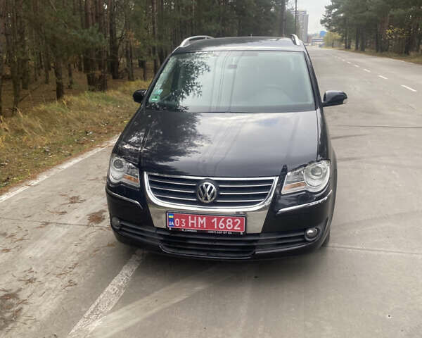 Чорний Фольксваген Туран, об'ємом двигуна 1.39 л та пробігом 187 тис. км за 6500 $, фото 2 на Automoto.ua