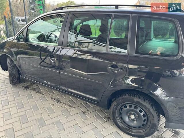 Чорний Фольксваген Туран, об'ємом двигуна 1.97 л та пробігом 313 тис. км за 7500 $, фото 31 на Automoto.ua