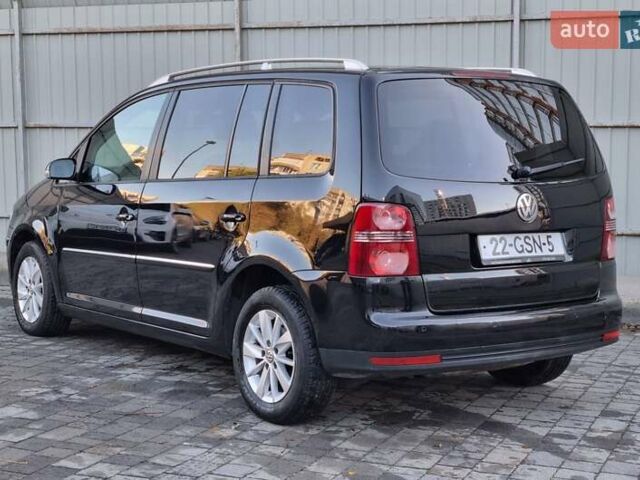 Черный Фольксваген Туран, объемом двигателя 1.4 л и пробегом 193 тыс. км за 7300 $, фото 33 на Automoto.ua