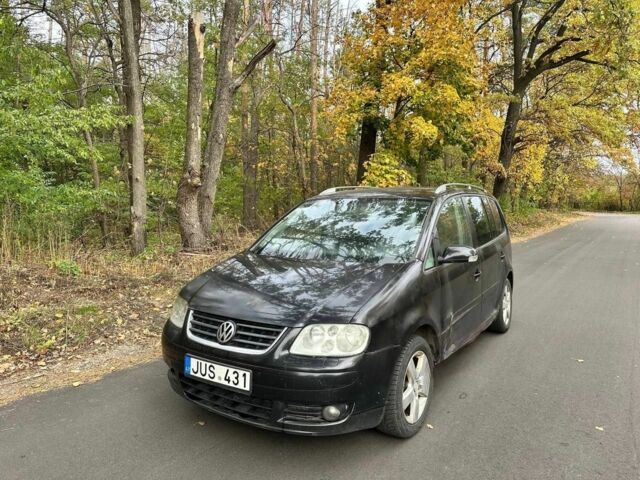 Черный Фольксваген Туран, объемом двигателя 1.9 л и пробегом 244 тыс. км за 1650 $, фото 6 на Automoto.ua