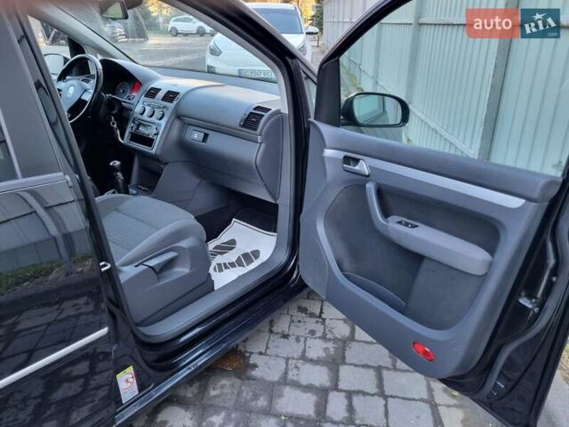 Черный Фольксваген Туран, объемом двигателя 1.4 л и пробегом 193 тыс. км за 7300 $, фото 11 на Automoto.ua