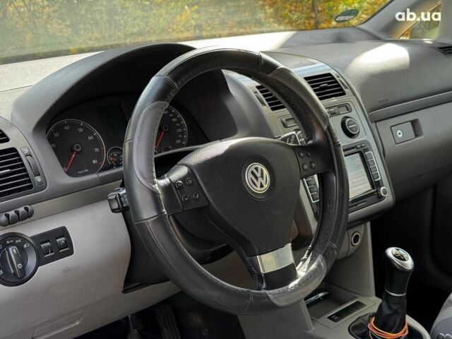Фольксваген Туран 2007 в Киеве на Automoto.ua Черный Фольксваген Туран, объемом двигателя 1.4 л и пробегом 242 тыс. км за 6390 $, фото 12 на Automoto.ua