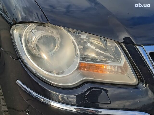 Чорний Фольксваген Туран, об'ємом двигуна 2 л та пробігом 260 тис. км за 9390 $, фото 4 на Automoto.ua