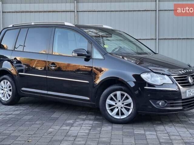 Черный Фольксваген Туран, объемом двигателя 1.4 л и пробегом 193 тыс. км за 7300 $, фото 25 на Automoto.ua