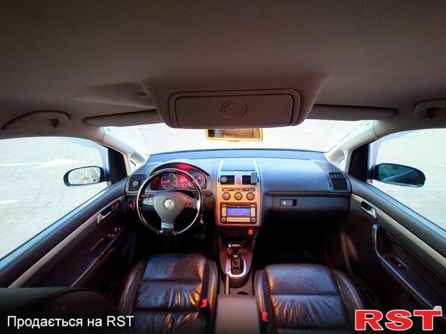 Чорний Фольксваген Туран, об'ємом двигуна 2 л та пробігом 240 тис. км за 7700 $, фото 7 на Automoto.ua