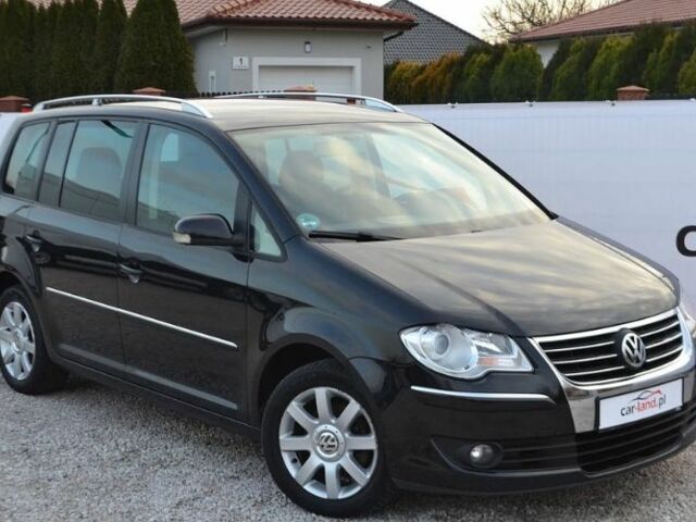 Черный Фольксваген Туран, объемом двигателя 2 л и пробегом 216 тыс. км за 5399 $, фото 1 на Automoto.ua