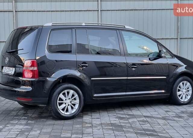 Черный Фольксваген Туран, объемом двигателя 1.4 л и пробегом 193 тыс. км за 7300 $, фото 30 на Automoto.ua