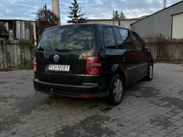 Черный Фольксваген Туран, объемом двигателя 2 л и пробегом 300 тыс. км за 3300 $, фото 5 на Automoto.ua