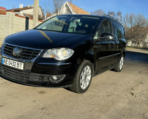 Черный Фольксваген Туран, объемом двигателя 1.4 л и пробегом 217 тыс. км за 8300 $, фото 3 на Automoto.ua