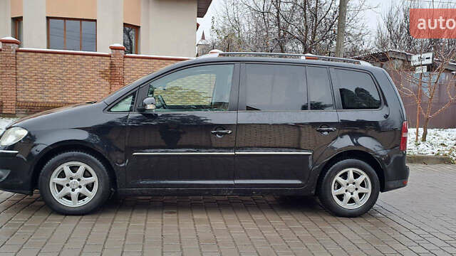 Черный Фольксваген Туран, объемом двигателя 1.4 л и пробегом 193 тыс. км за 6950 $, фото 9 на Automoto.ua