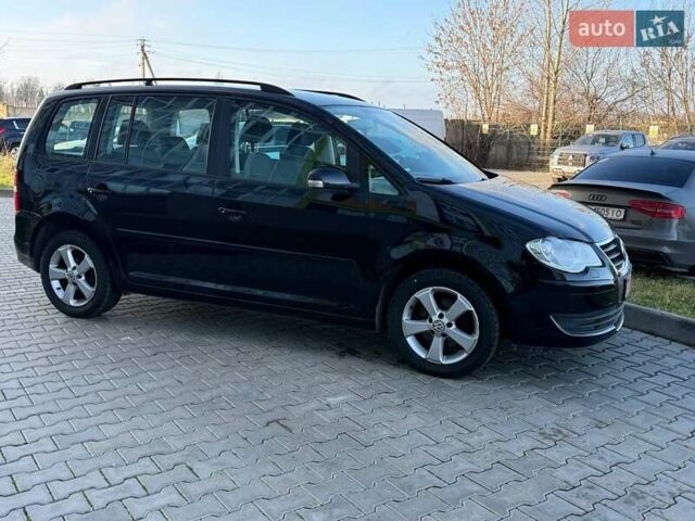 Чорний Фольксваген Туран, об'ємом двигуна 1.6 л та пробігом 178 тис. км за 7950 $, фото 2 на Automoto.ua