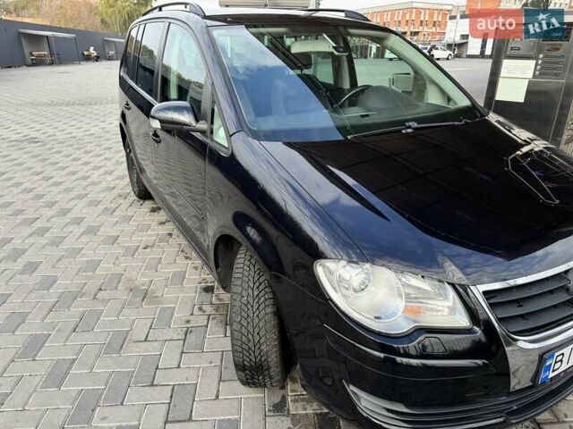 Черный Фольксваген Туран, объемом двигателя 1.97 л и пробегом 314 тыс. км за 7300 $, фото 17 на Automoto.ua