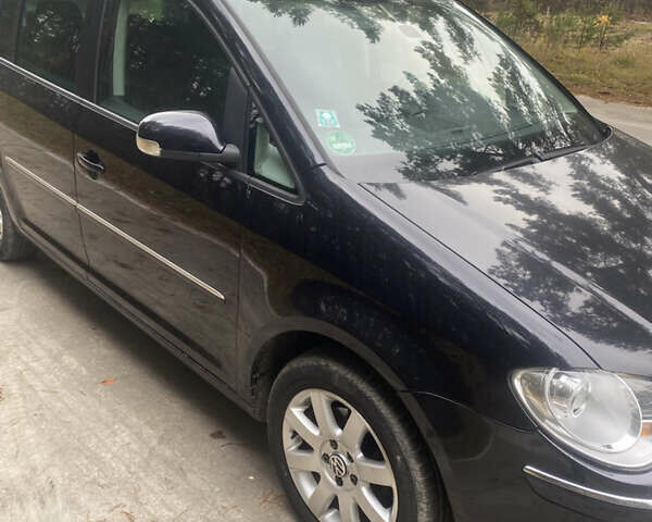 Чорний Фольксваген Туран, об'ємом двигуна 1.39 л та пробігом 187 тис. км за 6500 $, фото 14 на Automoto.ua