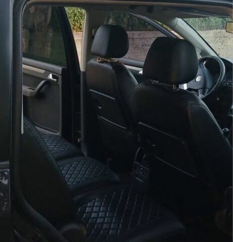 Черный Фольксваген Туран, объемом двигателя 1.9 л и пробегом 311 тыс. км за 5400 $, фото 7 на Automoto.ua