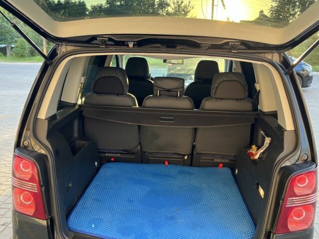 Черный Фольксваген Туран, объемом двигателя 1.4 л и пробегом 271 тыс. км за 5000 $, фото 7 на Automoto.ua