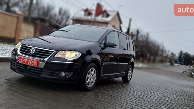 Черный Фольксваген Туран, объемом двигателя 1.4 л и пробегом 193 тыс. км за 6950 $, фото 3 на Automoto.ua