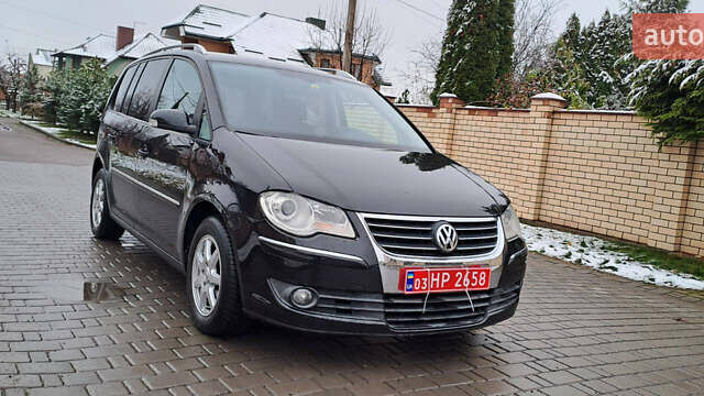 Черный Фольксваген Туран, объемом двигателя 1.4 л и пробегом 193 тыс. км за 6950 $, фото 14 на Automoto.ua