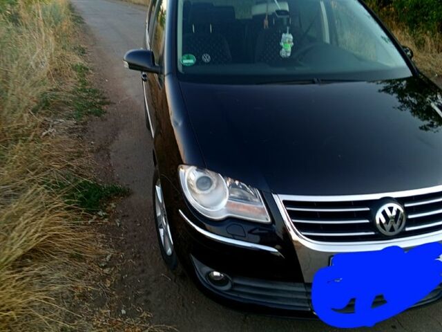 Чорний Фольксваген Туран, об'ємом двигуна 1.4 л та пробігом 207 тис. км за 7200 $, фото 1 на Automoto.ua