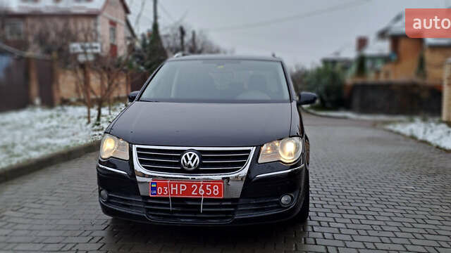Черный Фольксваген Туран, объемом двигателя 1.4 л и пробегом 193 тыс. км за 6950 $, фото 4 на Automoto.ua
