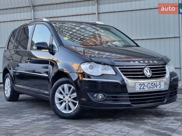 Черный Фольксваген Туран, объемом двигателя 1.4 л и пробегом 193 тыс. км за 7300 $, фото 23 на Automoto.ua