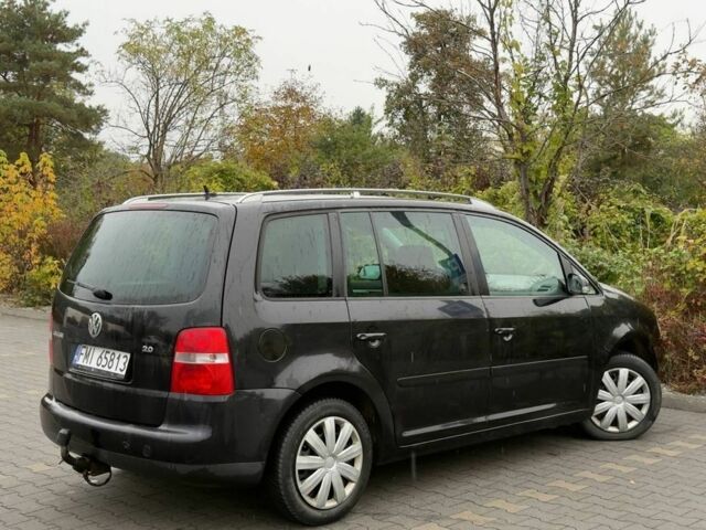 Черный Фольксваген Туран, объемом двигателя 1.9 л и пробегом 225 тыс. км за 2450 $, фото 3 на Automoto.ua