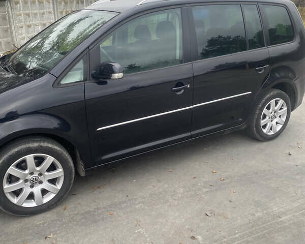 Чорний Фольксваген Туран, об'ємом двигуна 1.39 л та пробігом 187 тис. км за 6500 $, фото 10 на Automoto.ua