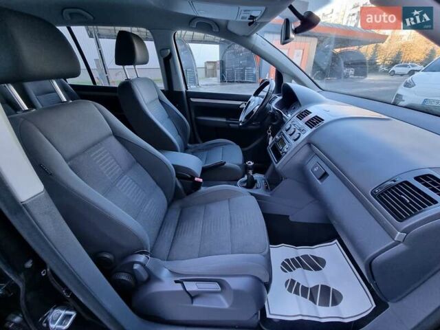 Черный Фольксваген Туран, объемом двигателя 1.4 л и пробегом 193 тыс. км за 7300 $, фото 13 на Automoto.ua