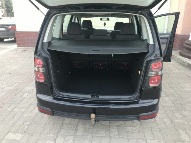 Черный Фольксваген Туран, объемом двигателя 1.4 л и пробегом 260 тыс. км за 6500 $, фото 4 на Automoto.ua