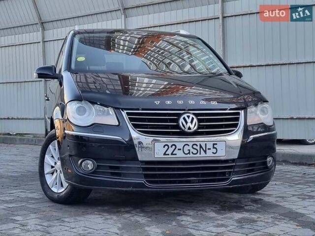 Черный Фольксваген Туран, объемом двигателя 1.4 л и пробегом 193 тыс. км за 7300 $, фото 21 на Automoto.ua