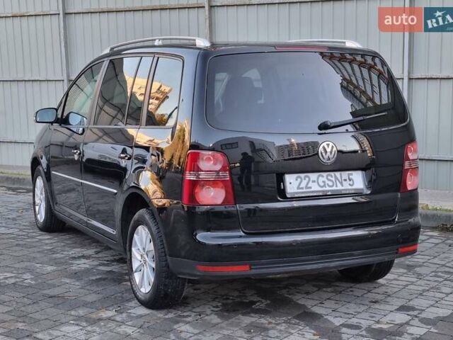 Черный Фольксваген Туран, объемом двигателя 1.4 л и пробегом 193 тыс. км за 7300 $, фото 32 на Automoto.ua