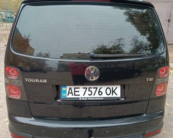Чорний Фольксваген Туран, об'ємом двигуна 1.4 л та пробігом 195 тис. км за 6900 $, фото 1 на Automoto.ua