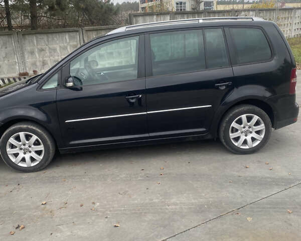 Чорний Фольксваген Туран, об'ємом двигуна 1.39 л та пробігом 187 тис. км за 6500 $, фото 12 на Automoto.ua