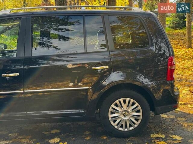 Фольксваген Туран 2007 в Киеве на Automoto.ua Черный Фольксваген Туран, объемом двигателя 1.4 л и пробегом 242 тыс. км за 6390 $, фото 9 на Automoto.ua
