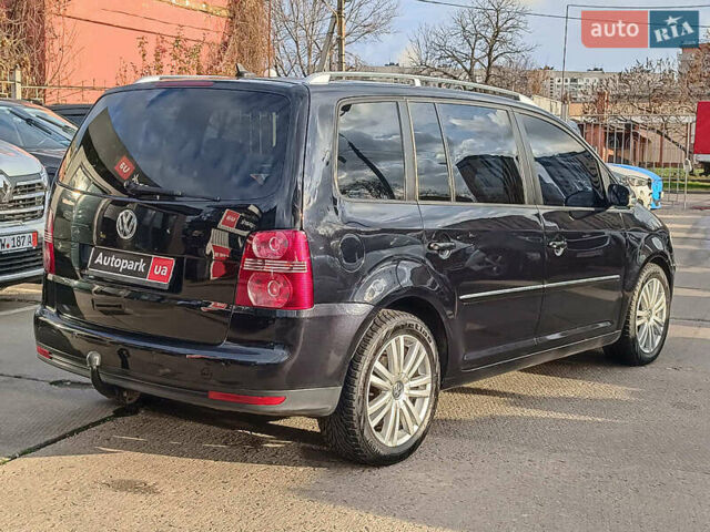 Черный Фольксваген Туран, объемом двигателя 2 л и пробегом 260 тыс. км за 9390 $, фото 7 на Automoto.ua