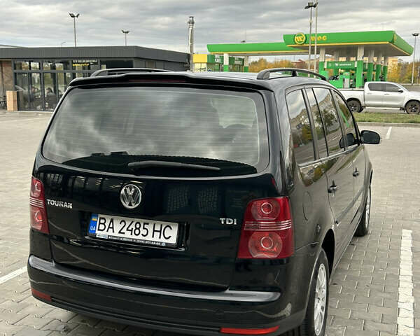 Чорний Фольксваген Туран, об'ємом двигуна 1.9 л та пробігом 124 тис. км за 8700 $, фото 4 на Automoto.ua