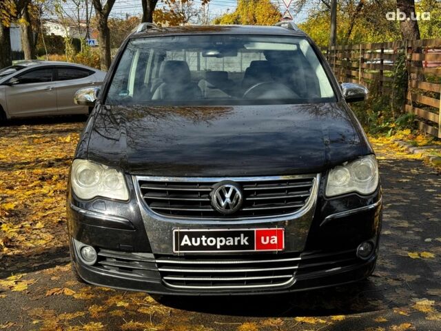 Фольксваген Туран 2007 в Киеве на Automoto.ua Черный Фольксваген Туран, объемом двигателя 1.4 л и пробегом 242 тыс. км за 6390 $, фото 1 на Automoto.ua