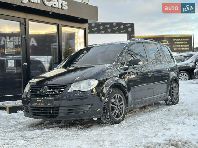 Черный Фольксваген Туран, объемом двигателя 1.39 л и пробегом 241 тыс. км за 8100 $, фото 5 на Automoto.ua