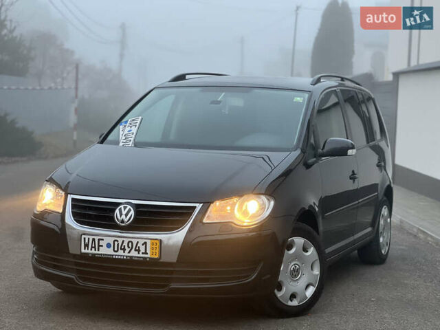 Чорний Фольксваген Туран, об'ємом двигуна 1.4 л та пробігом 248 тис. км за 7199 $, фото 20 на Automoto.ua