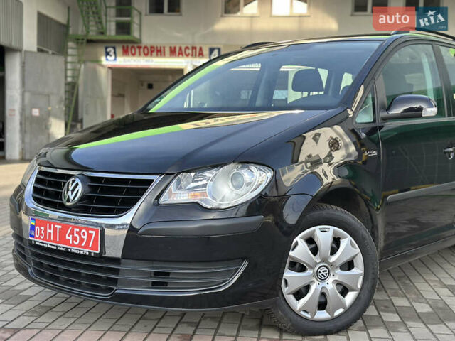 Черный Фольксваген Туран, объемом двигателя 1.6 л и пробегом 230 тыс. км за 7400 $, фото 5 на Automoto.ua
