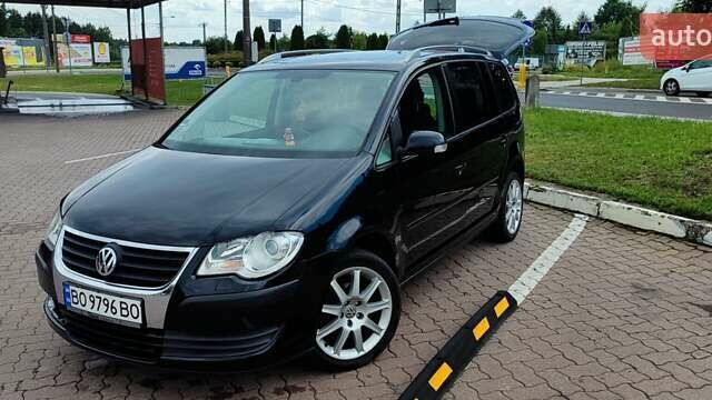 Черный Фольксваген Туран, объемом двигателя 1.97 л и пробегом 318 тыс. км за 6000 $, фото 30 на Automoto.ua
