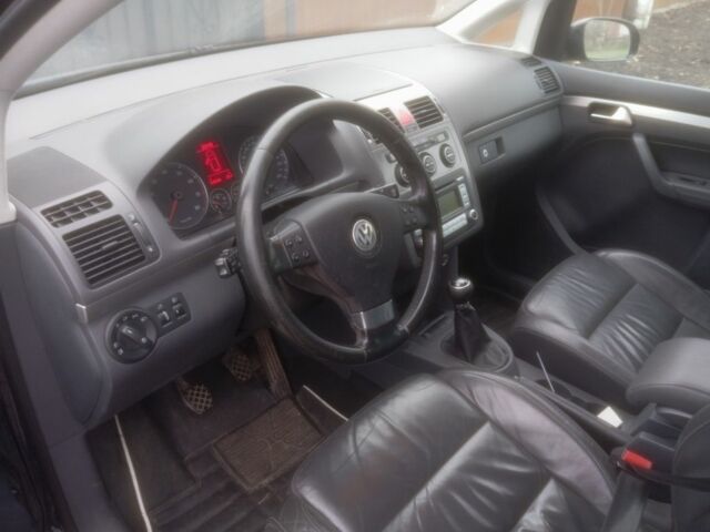 Чорний Фольксваген Туран, об'ємом двигуна 1.4 л та пробігом 268 тис. км за 5600 $, фото 6 на Automoto.ua