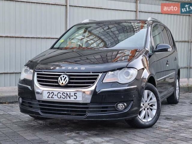 Черный Фольксваген Туран, объемом двигателя 1.4 л и пробегом 193 тыс. км за 7300 $, фото 18 на Automoto.ua
