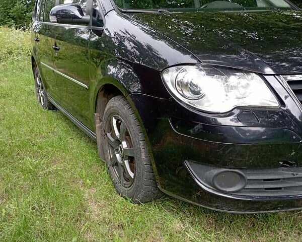 Черный Фольксваген Туран, объемом двигателя 2 л и пробегом 240 тыс. км за 5000 $, фото 7 на Automoto.ua