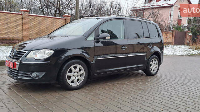 Черный Фольксваген Туран, объемом двигателя 1.4 л и пробегом 193 тыс. км за 6950 $, фото 10 на Automoto.ua