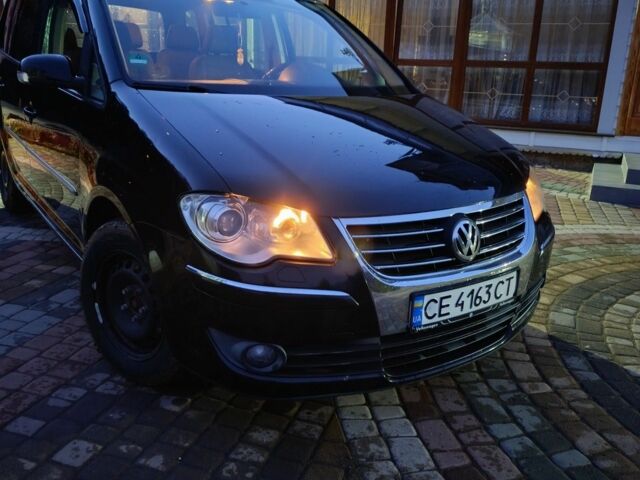 Черный Фольксваген Туран, объемом двигателя 2 л и пробегом 320 тыс. км за 6800 $, фото 2 на Automoto.ua