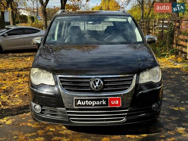Фольксваген Туран 2007 в Киеве на Automoto.ua Черный Фольксваген Туран, объемом двигателя 1.4 л и пробегом 242 тыс. км за 6390 $, фото 1 на Automoto.ua