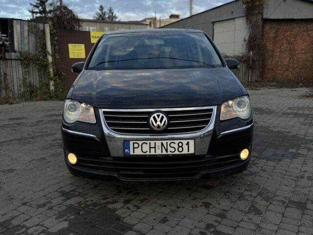 Черный Фольксваген Туран, объемом двигателя 2 л и пробегом 300 тыс. км за 3300 $, фото 1 на Automoto.ua