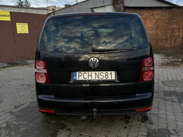 Черный Фольксваген Туран, объемом двигателя 2 л и пробегом 300 тыс. км за 3300 $, фото 4 на Automoto.ua